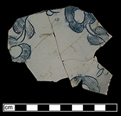 Scratch blue saucer in floral pattern, recovered from cellar hole dating to mid-18th century, lots 1 and 2.